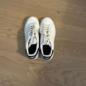 White Sneakers with Black Accents